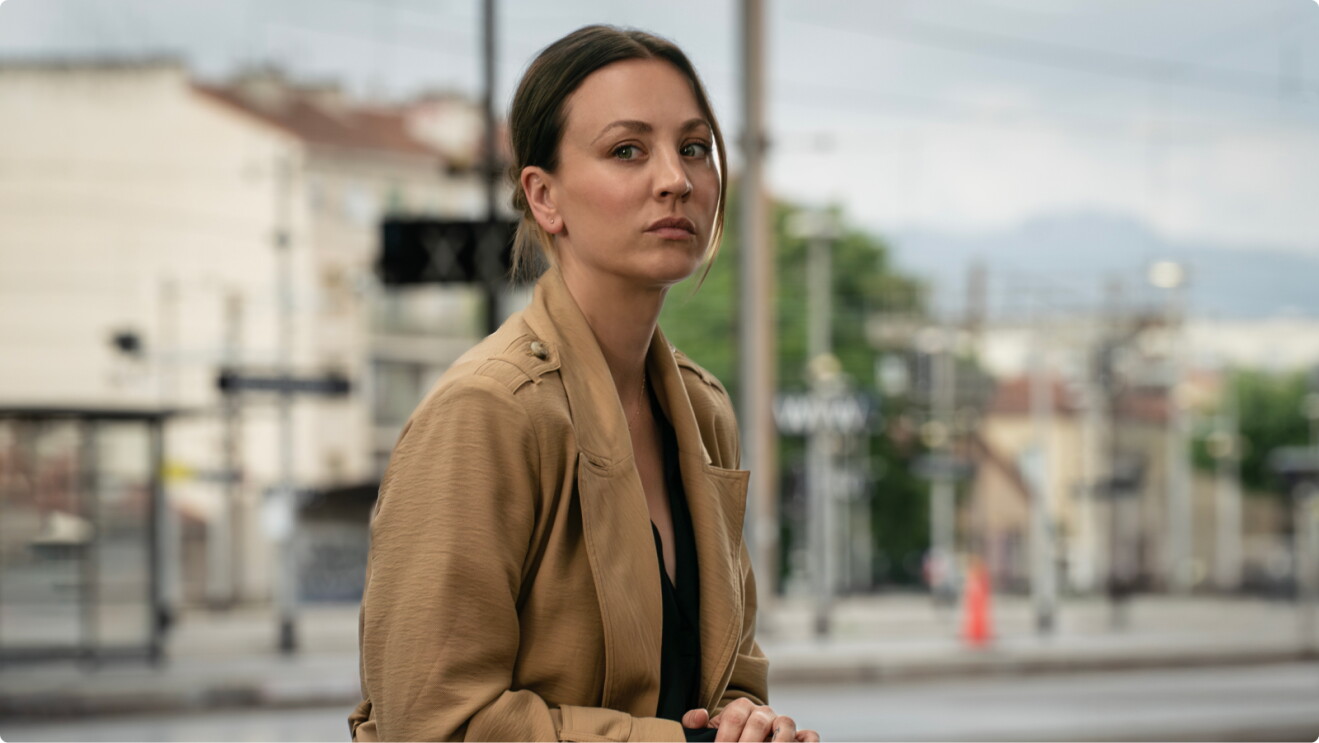Vanished starring Kaley Cuoco, who waits at a train station looking concerned. 