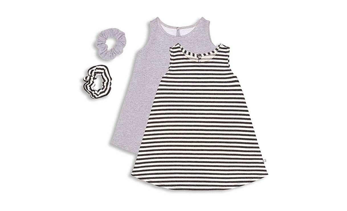 A product image of neutral baby clothes from Miles and Milan.