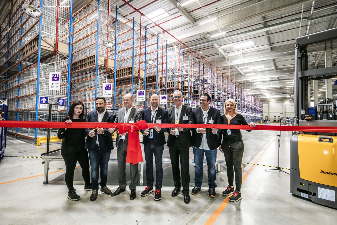 Christos Kalpakidis, Dirk Büscher, Alexander Bruggner,Michael Risse und Frédéric Penka_schneiden das rote Band durch