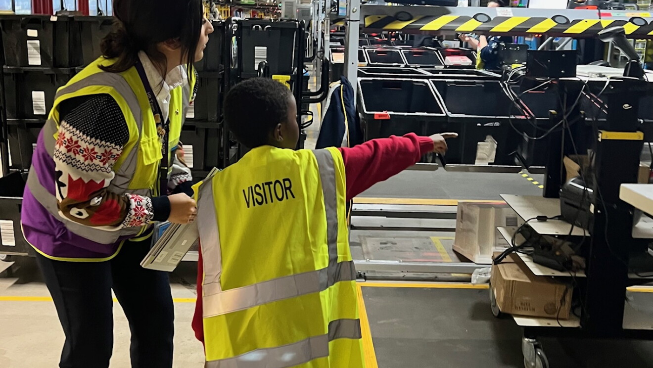 Amazon employees at FC with their children
