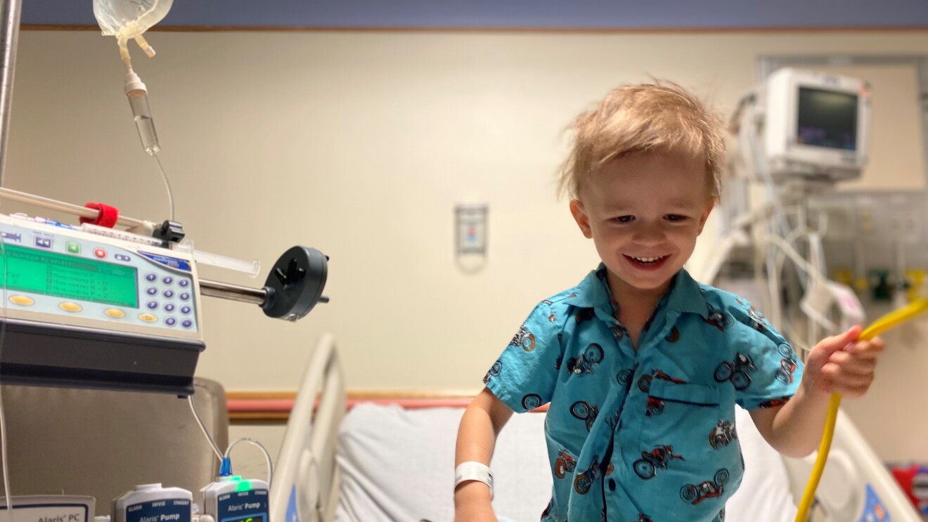 Picture of little Wes, a smiling blond boy wearing a pajama and holding a stethoscope.