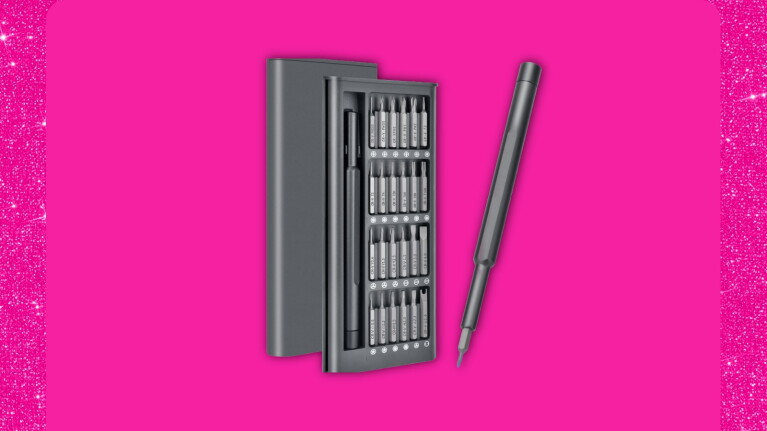 Precision screwdriver set with multiple bits displayed on bright pink background