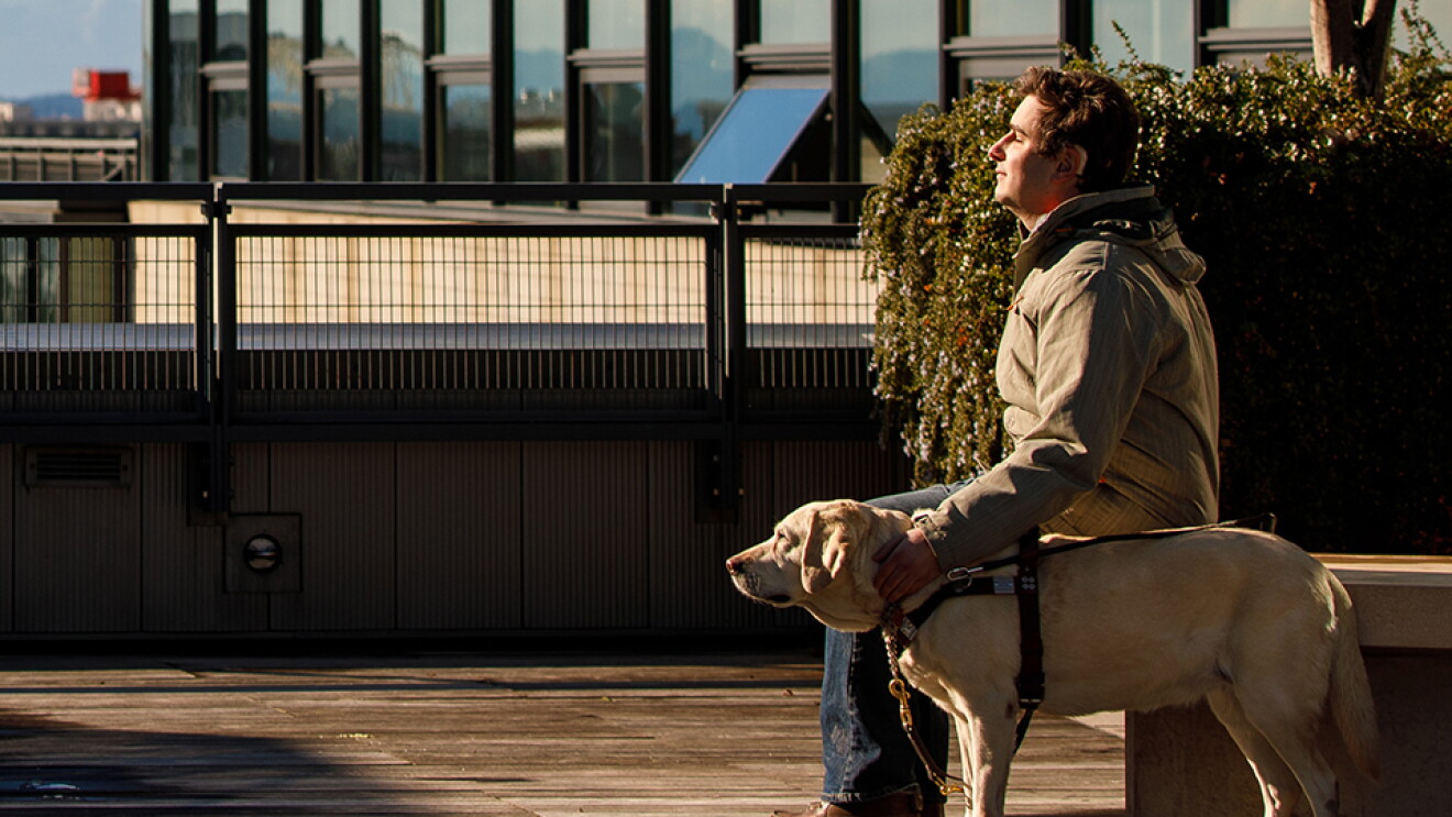 Amazon software engineer Michael Forzano and his guide dog