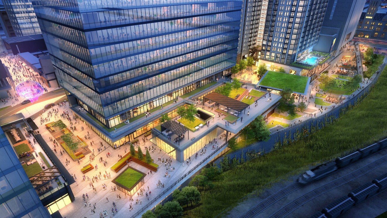 Preview of the new Amazon building coming to Nashville, Tennessee. Street view of the exterior of the building and surrounding sidewalks and green space.