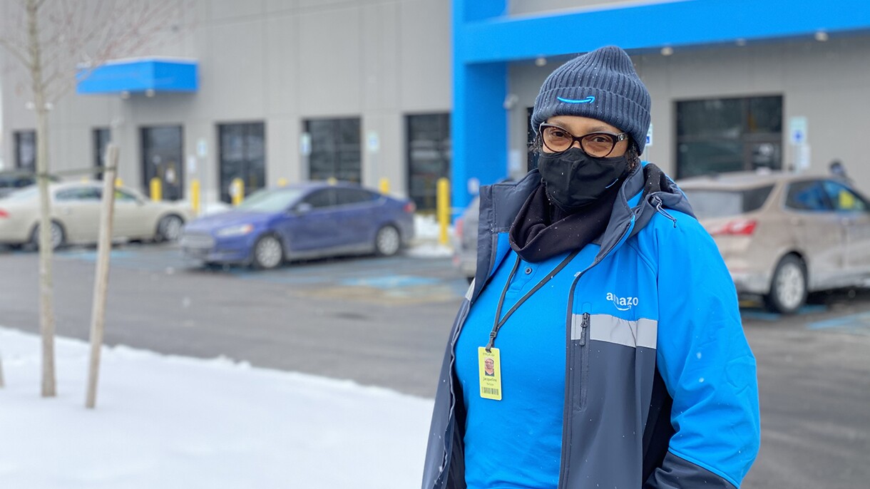 An image of a Black woman who is leading a company that supports Amazon's middle and last mile logistics operations. 