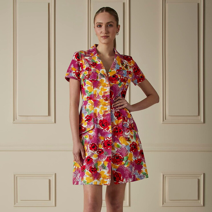 Models wearing clothing and purses from the What Goes Around Comes Around capsule collection.