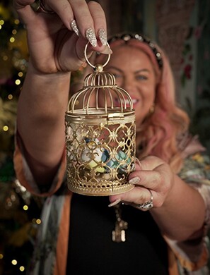 Metal Birdcage Tealight Lanterns*, Currently priced at £9.72 for two, Gold Leaf Spray Paint, Currently priced at £10.27, Artificial Colourful Feather Bird Decorations (12 pcs), Currently priced at £18.69, available at Amazon.co.uk. 