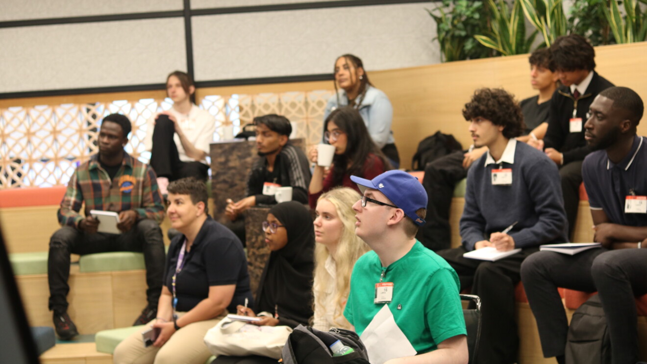 Diverse group of young adults attending a seminar or workshop