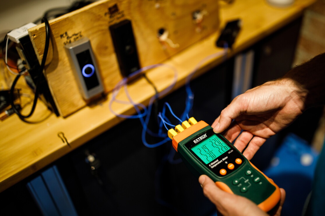 A device measures the output of prototype Ring doorbells. 