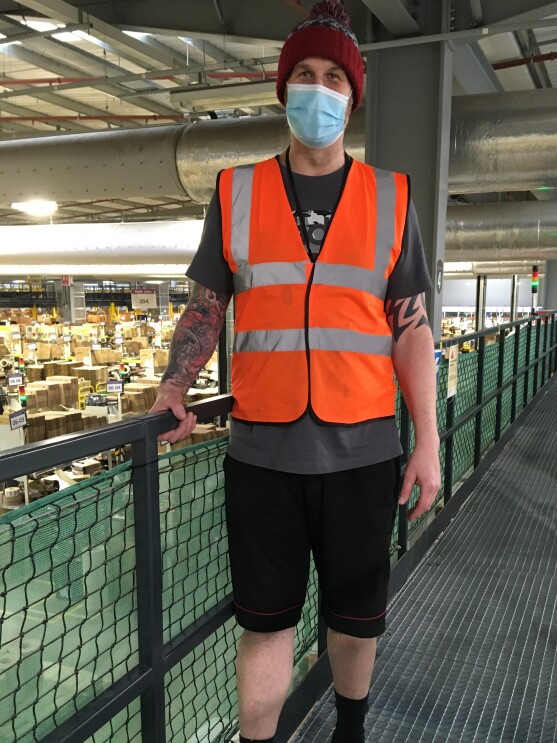 EDI4 - Stuart Sked, FC Associate standing in a fulfilment centre.