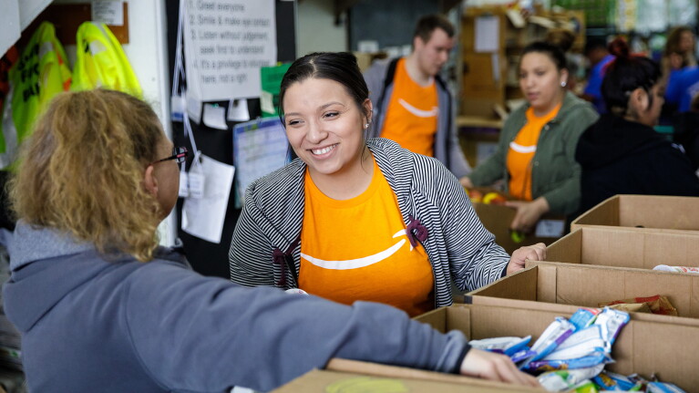 Amazon employees volunteer at a local food bank in the Puget Sound region of Washington state