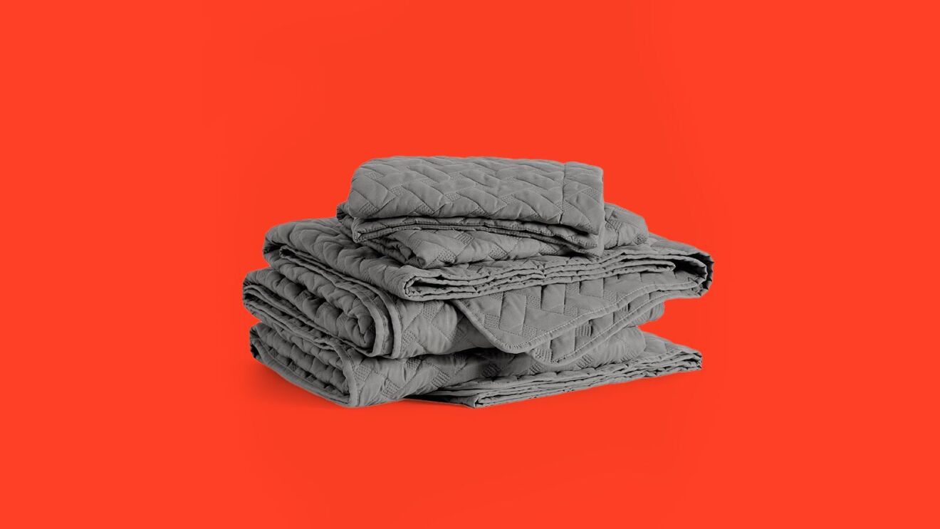 An image of a gray quilted bedding set.