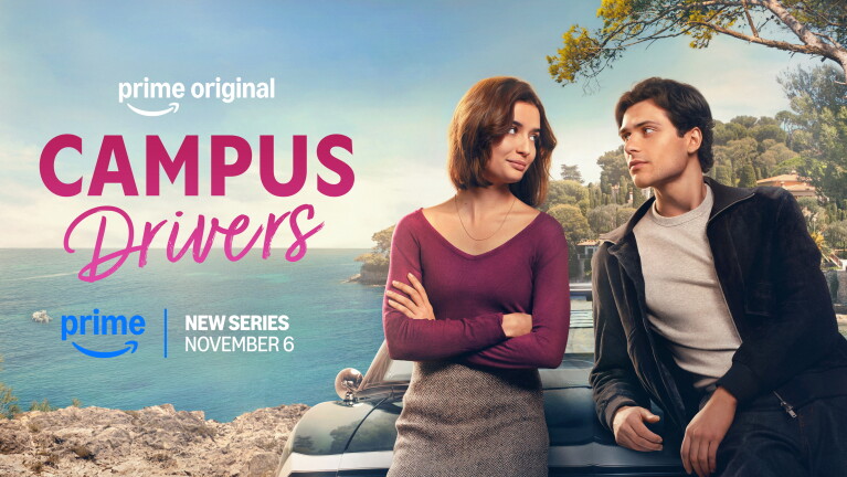 Young man and woman look at each other while leaning on a car with a coastal background