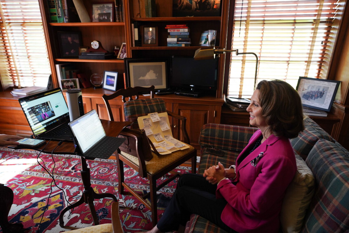 A woman on a laptop computer, working from home
