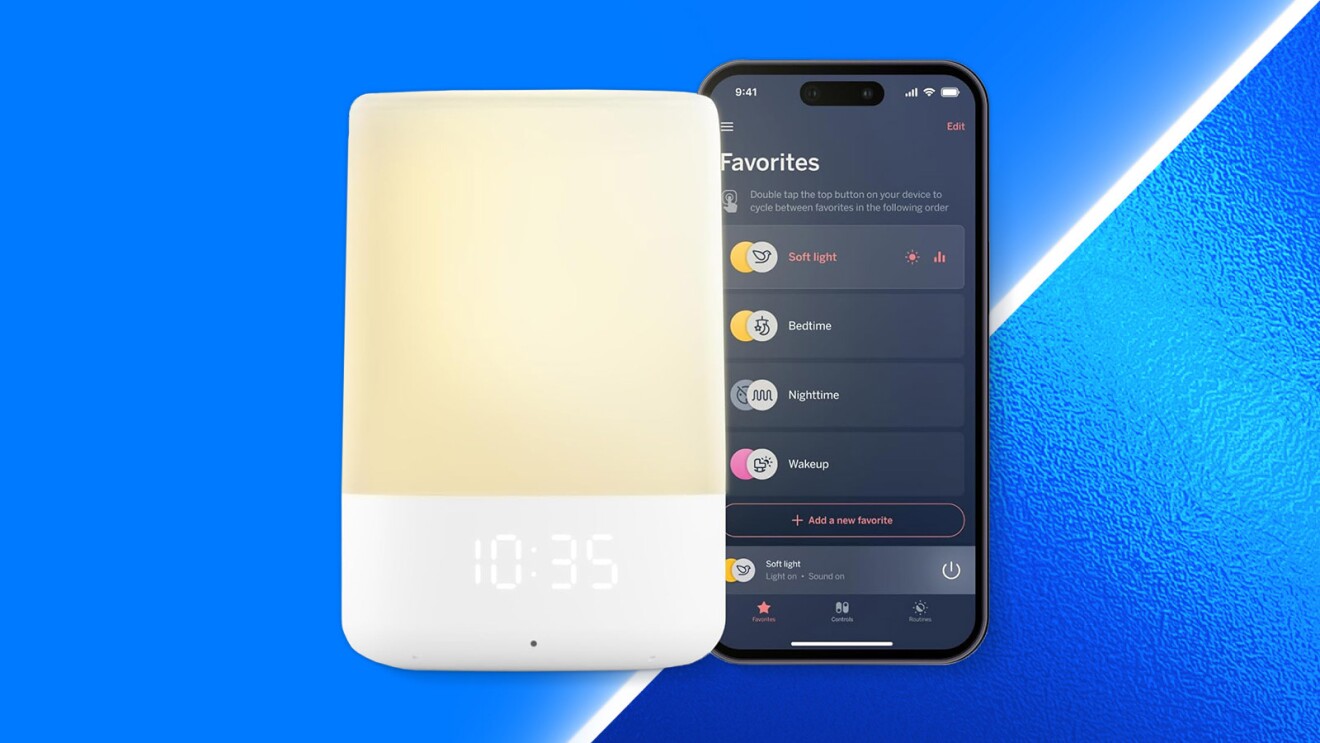 Bedside lamp and sound machine next to phone showing lighting presets