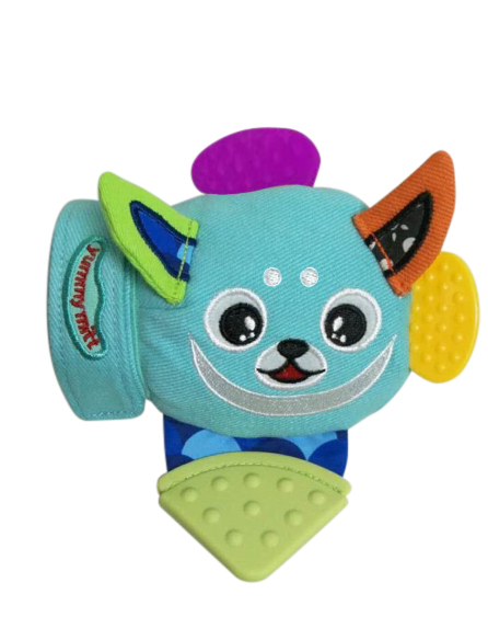 A baby's mitten with various teething toys attached to it. The words "yummy mitt" are on the wrist area of the mitten.