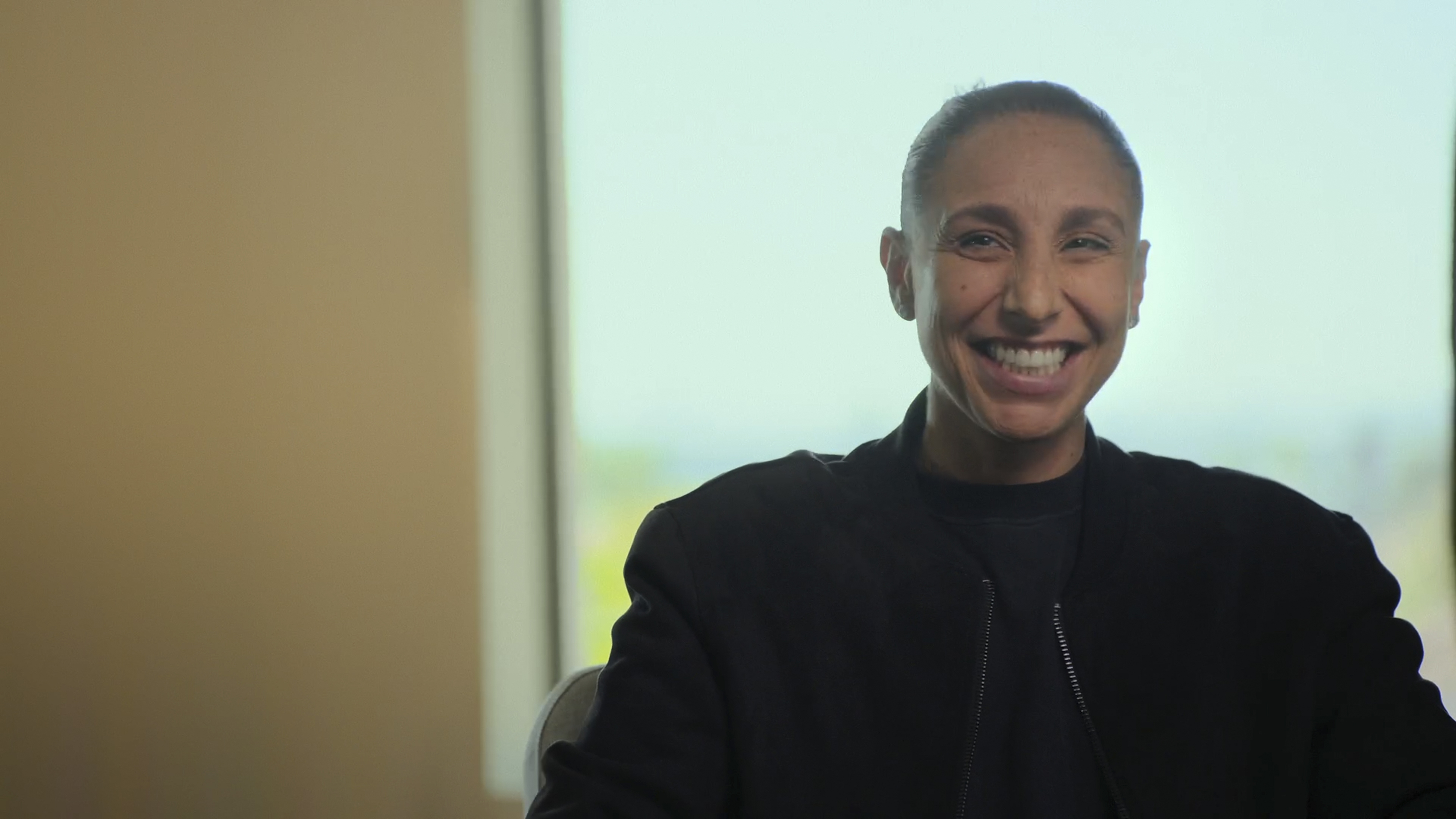 Diana Taurasi smiling in interview.
