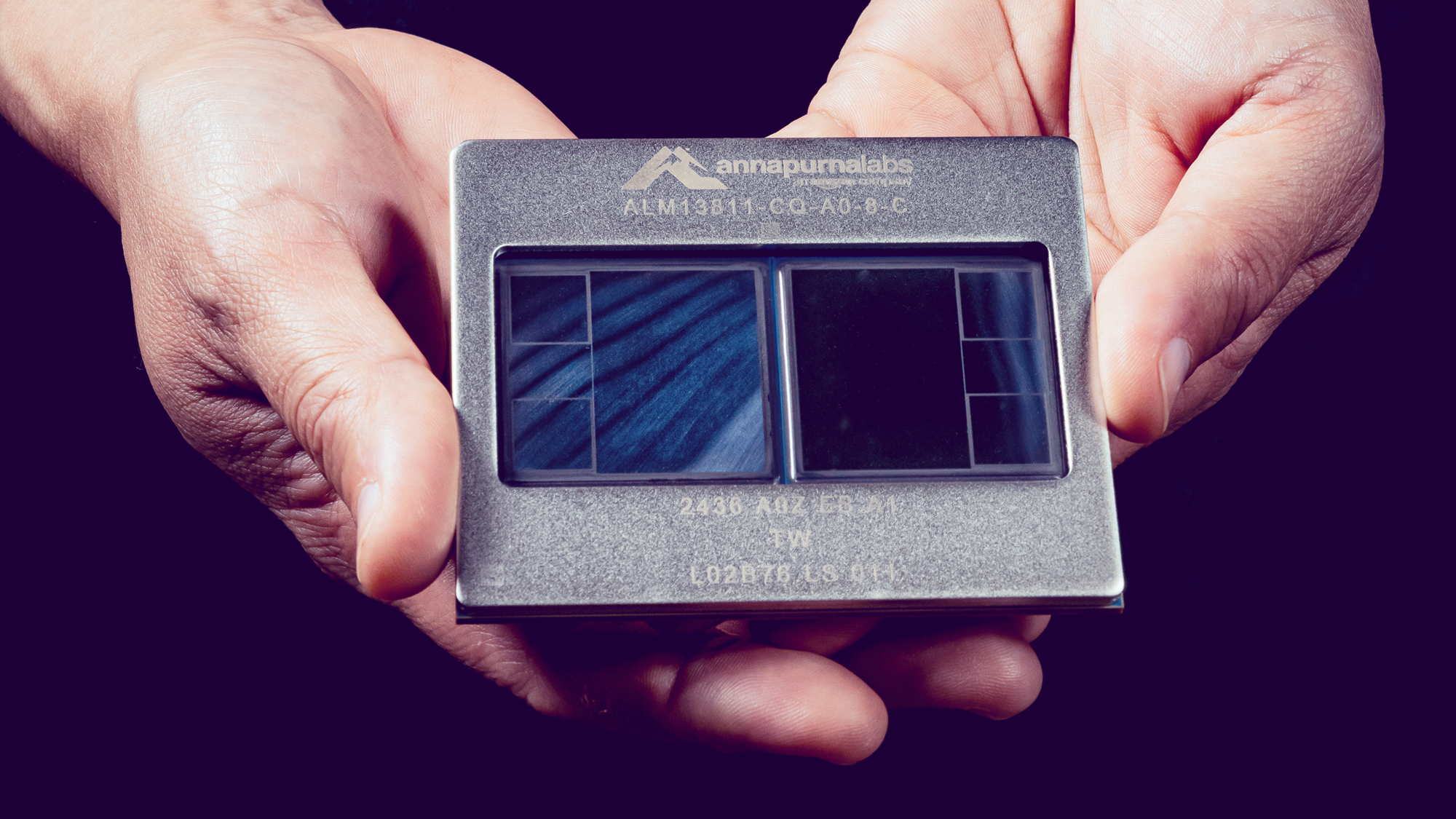 Annapurna Labs Trainium2 chip being held in two hands
