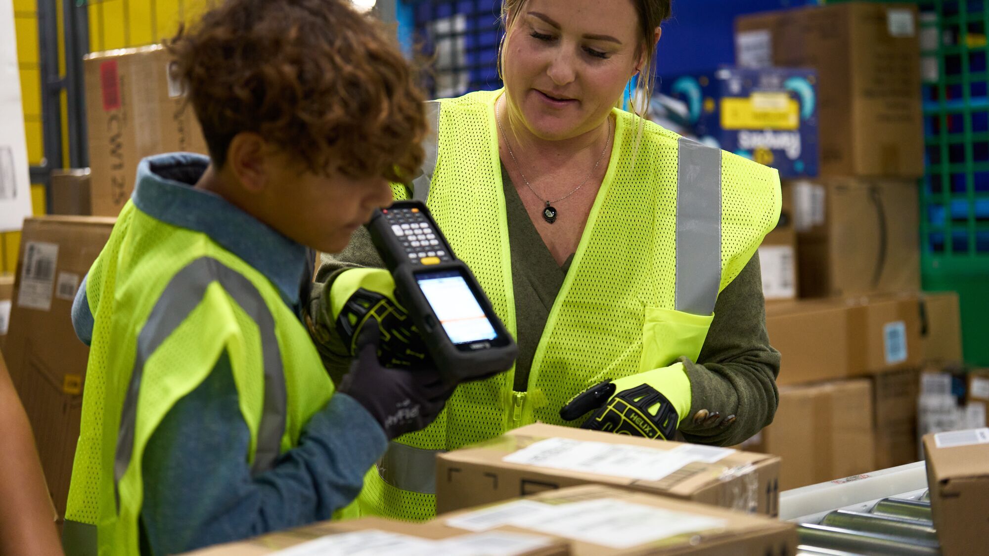 Kids explain how their Amazon parents create holiday magic at a fulfillment center.