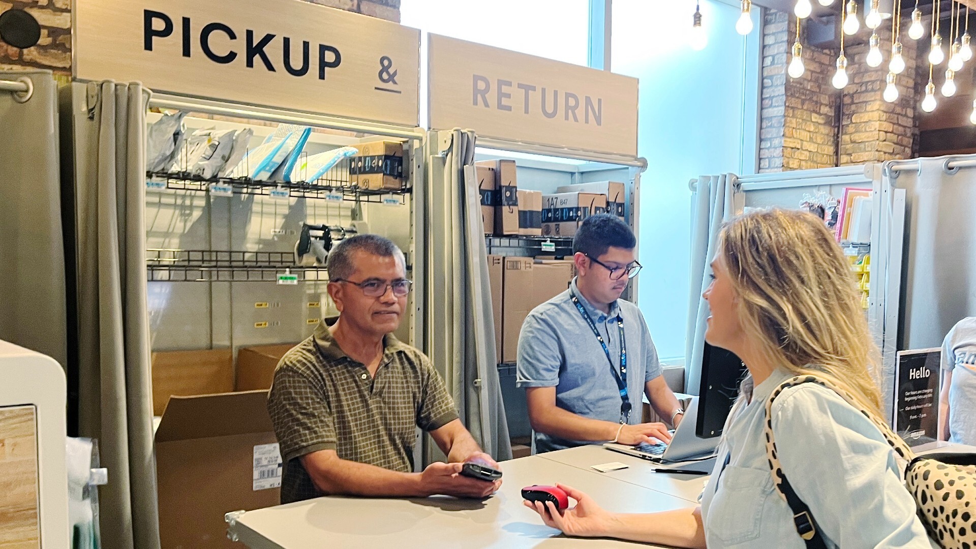 A customer makes an Amazon return at a Whole Foods Market store.