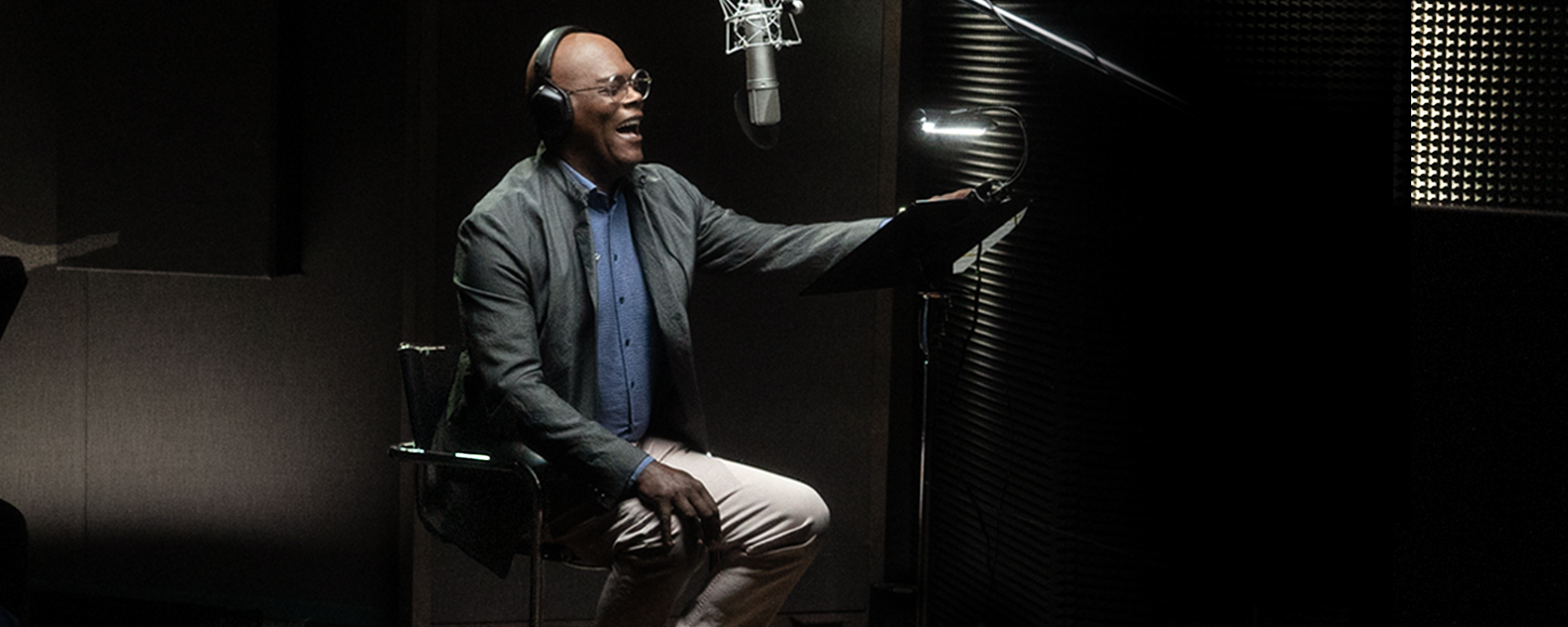 A photo of Samuel L. Jackson in a recording studio.